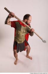 Man Adult Average White Fighting with spear Standing poses Casual